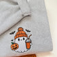 Meet the ultimate autumn mood: a cute embroidered ghost rocking a cozy orange toque, clutching an iced pumpkin spice coffee and a classic jack-o'-lantern. Designed with dense, high-quality embroidery for long-lasting wear, this cozy heather grey crewneck is the perfect mix of trendy and nostalgic for everyday spooky season style.