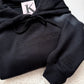 Sarcastic embroidered ‘spooky bitch’ black sweater, with custom sleeve ‘let’s curse some fuckers’. 