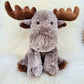 Plush moose toy on a white fluffy surface