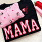 Applique embroidered keepsake baby pajama sweater. MAMA embroidered onto a black sweater. Handmade mama sweater. Gifts for mom stitched locally in Ontario, Canada.