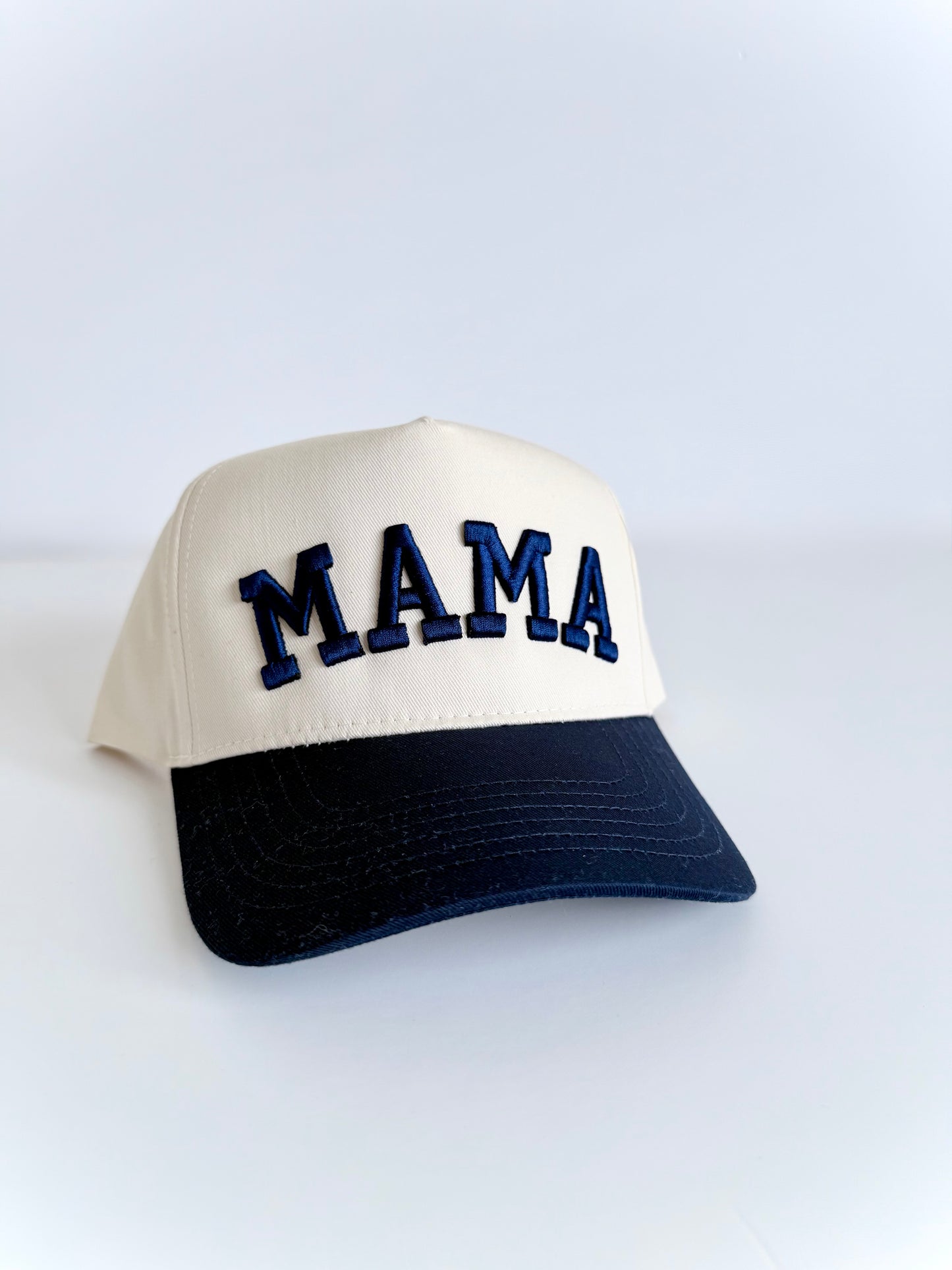 Cap with 'MAMA' text on a white background