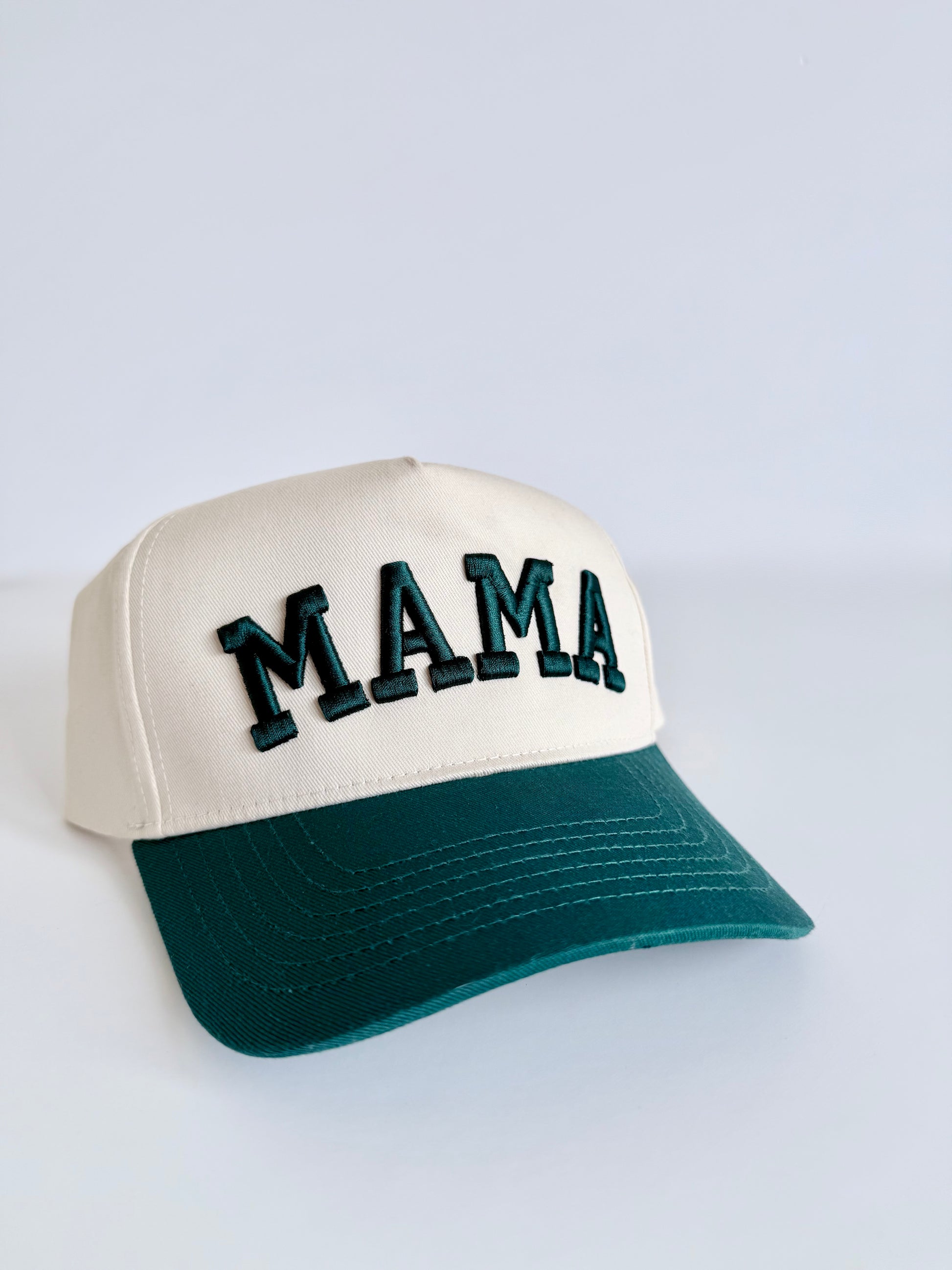 Cap with 'MAMA' text on a light gray background