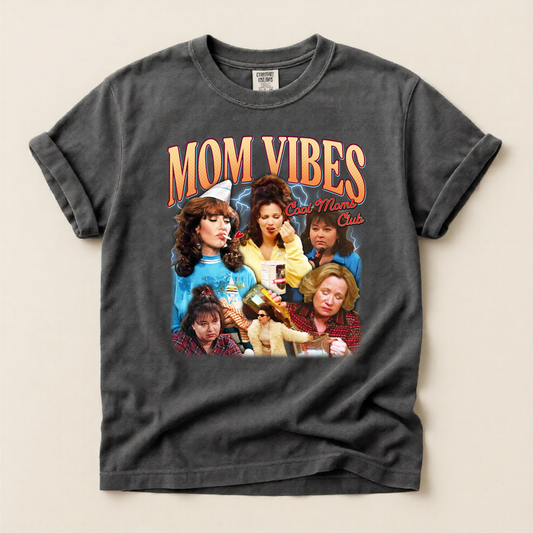 Gray t-shirt with 'Mom Vibes' graphic featuring a collage of women on a beige background