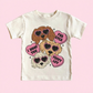 Children's t-shirt with cartoon dogs and heart-shaped text on a pink background