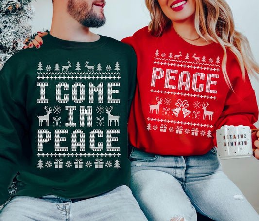 Couple ugly christmas sweaters