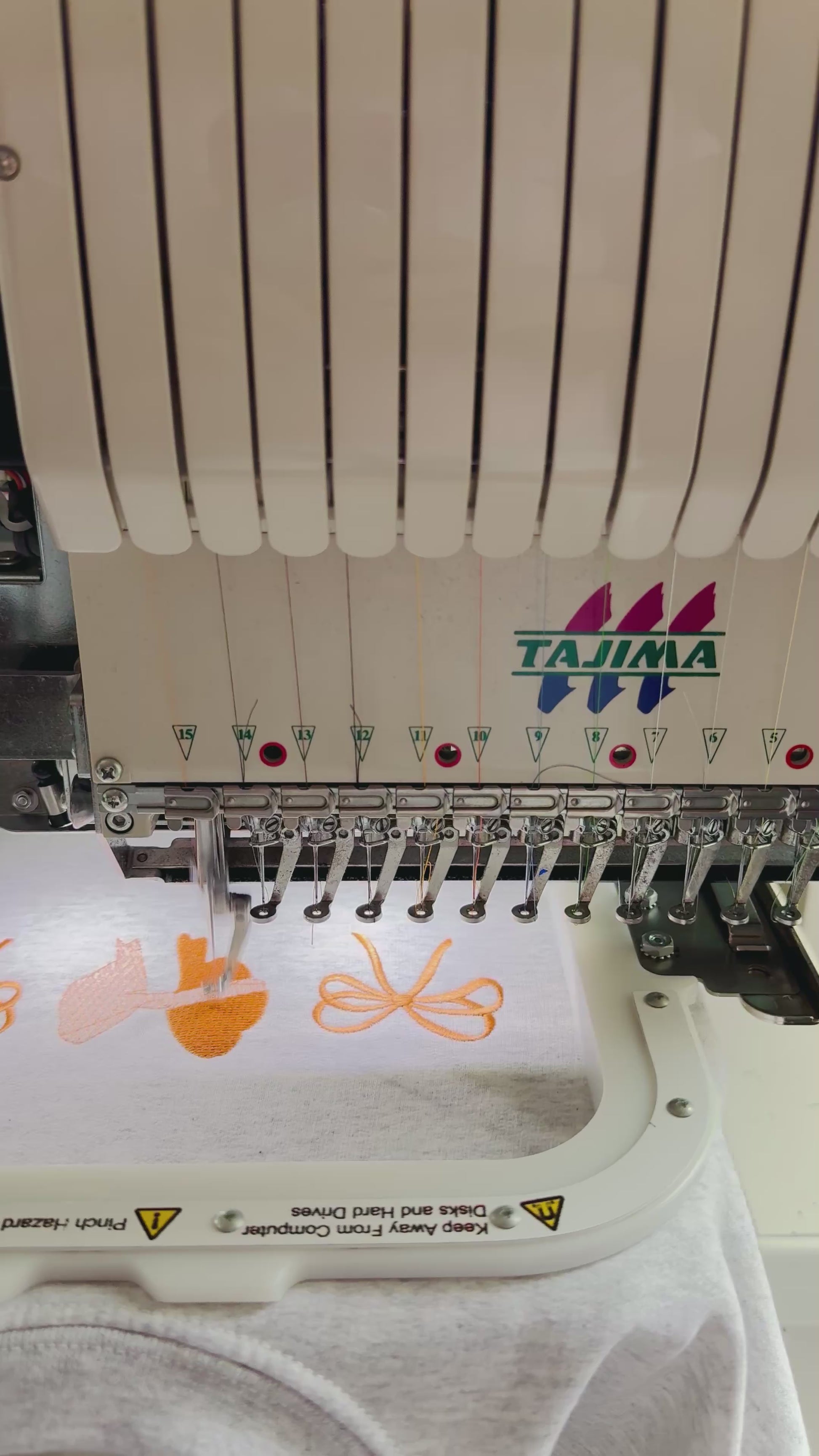 Autumn coquette bows being embroidered stitched in house by a small business located in greater toronto area, Ontario, Canada.