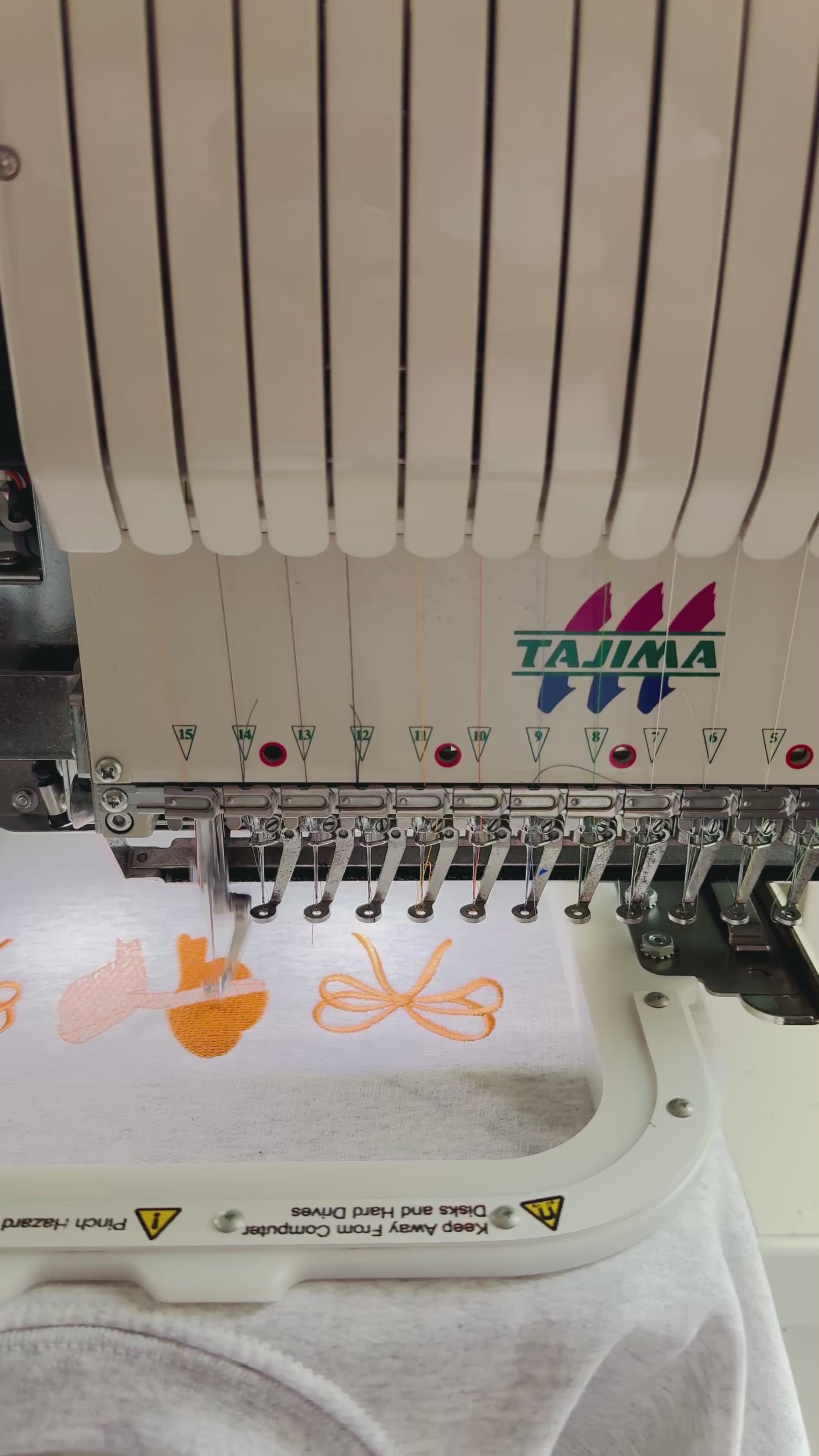 Autumn coquette bows being embroidered stitched in house by a small business located in greater toronto area, Ontario, Canada.
